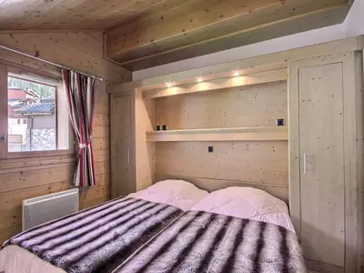 Un ou plusieurs lits dans un hébergement de l'établissement Appartement skis aux pieds pour 6 pers proche centre Vallandry, animaux admis - FR-1-411-918
