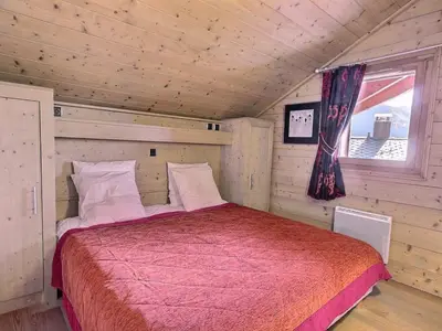 Un ou plusieurs lits dans un hébergement de l'établissement Appartement skis aux pieds pour 6 pers proche centre Vallandry, animaux admis - FR-1-411-918