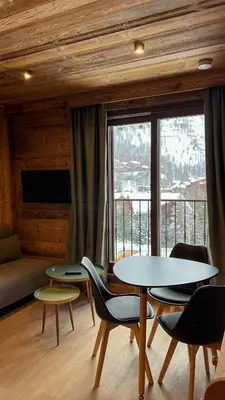 Télévision ou salle de divertissement dans l'établissement Résidence GRAND COCOR, Skis aux pieds -Studio 25 m2- by MONTBLANC LOGDE