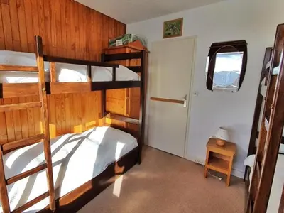 Un ou plusieurs lits dans un hébergement de l'établissement Appartement cosy proche pistes - 6 pers - Balcon - FR-1-502-550