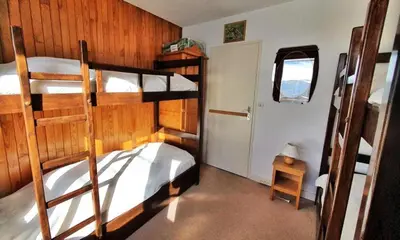 Un ou plusieurs lits dans un hébergement de l'établissement Résidence Curling B1-b2 - Appartement confortable · Proche des pistes MAE-6851