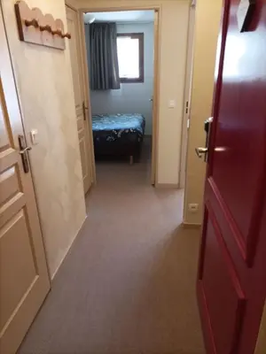 Un ou plusieurs lits dans un hébergement de l'établissement Résidence Les Alpages 4 étoiles - Appartement 4 personnes - Piscine, Hammam, Sauna, Jacuzzi - ValCenis 73480