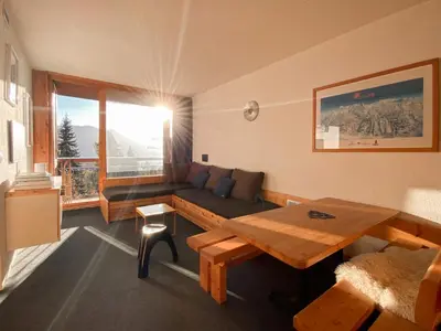 Coin salon dans l'établissement Appartement Perriand Les Arcs 1800