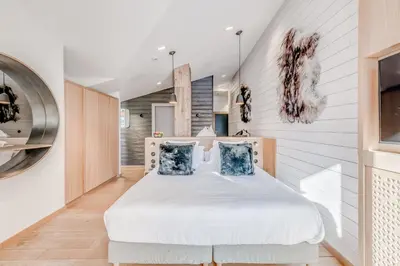 Un ou plusieurs lits dans un hébergement de l'établissement Le Yule Hotel & Spa