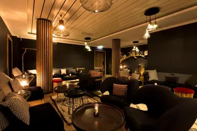 Coin salon dans l'établissement Le Yule Hotel & Spa