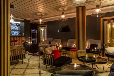 Coin salon dans l'établissement Le Yule Hotel & Spa