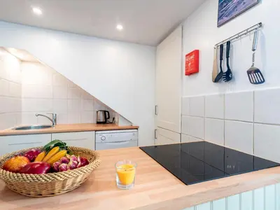 Cuisine ou kitchenette dans l'établissement Apartment Les Hauts du Val Claret - Val Claret-24 by Interhome