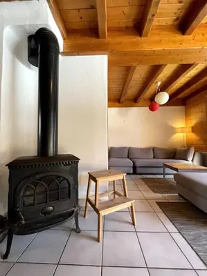 Coin salon dans l'établissement Chalet le Génépi 4-6 pers