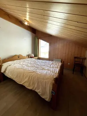 Un ou plusieurs lits dans un hébergement de l'établissement Chalet le Génépi 4-6 pers