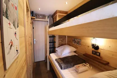 Un ou plusieurs lits dans un hébergement de l'établissement Résidence Home Club - Studio rénové · proche piste et commerce · balcon MAE-9081