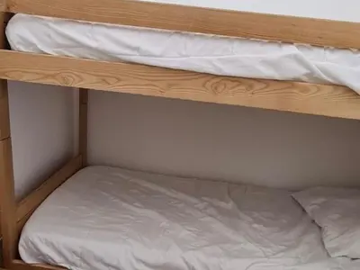 Un ou plusieurs lits dans un hébergement de l'établissement Tignes - Appartement 2 pièces cabine, 6 pers, vue sur montagne - FR-1-449-193