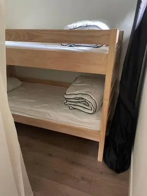 Un ou plusieurs lits dans un hébergement de l'établissement Studio cosy en pleine nature proche des pistes