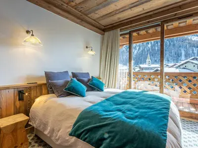Un ou plusieurs lits dans un hébergement de l'établissement Luxueux appartement 5 pièces avec balcons et vues, proche pistes - FR-1-694-354