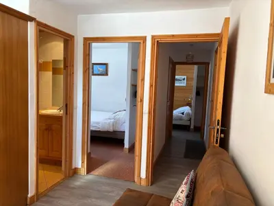 Un ou plusieurs lits dans un hébergement de l'établissement Beau 3 pièces avec vue Montana 4
