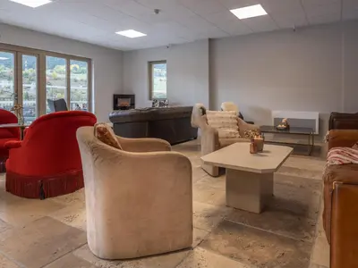 Coin salon dans l'établissement Résidence Les Terrasses de Termignon - Val-Cenis