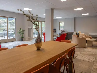 Coin salon dans l'établissement Résidence Les Terrasses de Termignon - Val-Cenis
