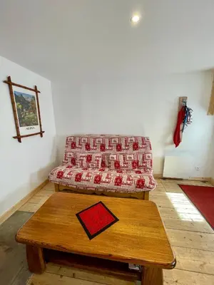 Coin salon dans l'établissement La MaiZon du Bois Rez-de-Chaussée