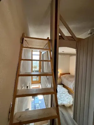 Un ou plusieurs lits dans un hébergement de l'établissement Duplex Belles Challes