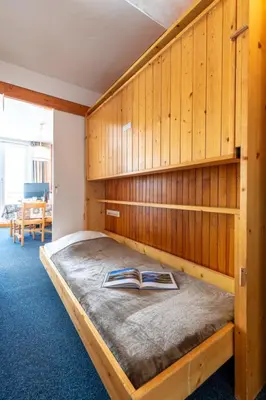 Un ou plusieurs lits dans un hébergement de l'établissement Studio résidence Le Lac - Le lac by Interhome