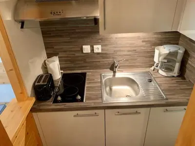 Cuisine ou kitchenette dans l'établissement Paradiski proche pistes et commerces vallandry