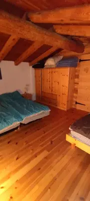 Un ou plusieurs lits dans un hébergement de l'établissement Tony gîte chelou