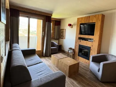 Coin salon dans l'établissement Résidence Le Centaure - Grand appartement pour 10 personnes · Résidence avec accès direct aux pistes MAE-0541