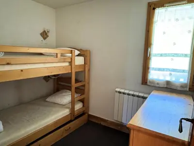Un ou plusieurs lits dans un hébergement de l'établissement Résidence Le Centaure - Grand appartement pour 10 personnes · Résidence avec accès direct aux pistes MAE-0541