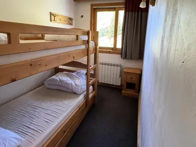 Un ou plusieurs lits dans un hébergement de l'établissement Résidence Le Centaure - Appartement agréable · Ski aux pieds MAE-0601