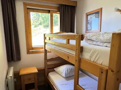 Un ou plusieurs lits dans un hébergement de l'établissement Résidence Le Centaure - Appartement spacieux · Résidence ski aux pieds MAE-0621