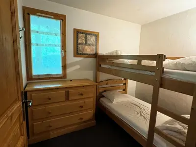 Un ou plusieurs lits dans un hébergement de l'établissement Résidence Le Centaure - Appartement pour 6 personnes · Ski aux pieds · Sur le haut de Belle Plagne MAE-0631