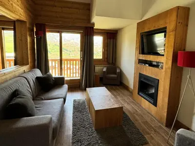 Télévision ou salle de divertissement dans l'établissement Résidence Le Centaure - Bel appartement avec grand séjour · Résidence ski aux pieds · Exposition sud ouest MAE-0671