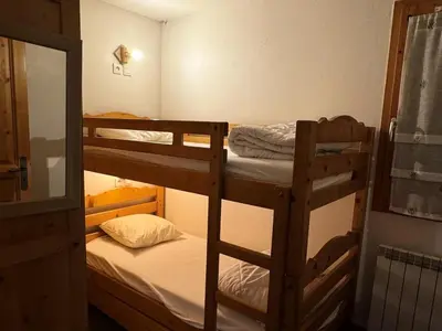 Un ou plusieurs lits dans un hébergement de l'établissement Résidence Le Centaure - Bel appartement avec grand séjour · Résidence ski aux pieds · Exposition sud ouest MAE-0671