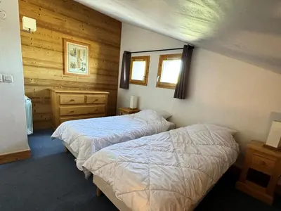 Un ou plusieurs lits dans un hébergement de l'établissement Résidence Le Centaure - Appartement agréable sur le haut de Belle Plagne · Ski aux pieds MAE-0701