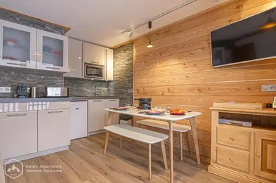 Cuisine ou kitchenette dans l'établissement Le Balcon de la Parrachée