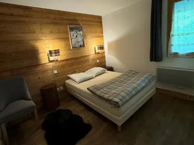 Un ou plusieurs lits dans un hébergement de l'établissement Appartement 3ch · 70m² · Ski aux pieds · Piscine · Animaux admis - FR-1-181-2816