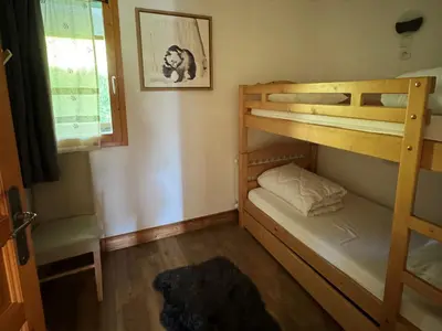 Un ou plusieurs lits dans un hébergement de l'établissement Appartement 3ch · 70m² · Ski aux pieds · Piscine · Animaux admis - FR-1-181-2816