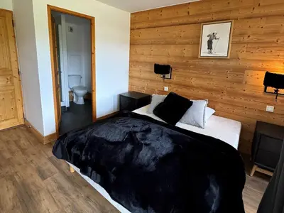 Un ou plusieurs lits dans un hébergement de l'établissement Appartement 3ch · 70m² · Ski aux pieds · Piscine · Animaux admis - FR-1-181-2816