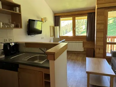 Cuisine ou kitchenette dans l'établissement Duplex cosy à Belle Plagne - Ski aux pieds, balcon, piscine, bien-être, animaux admis - FR-1-181-2821