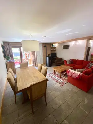 Coin salon dans l'établissement Appartement cosy, spacieux & moderne - 95m2