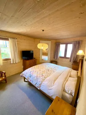Un ou plusieurs lits dans un hébergement de l'établissement Appartement cosy, spacieux & moderne - 95m2