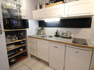 Cuisine ou kitchenette dans l'établissement Tignes : Appartement 4 pers, ski aux pieds, balcon, animaux OK, parking, WiFi - FR-1-502-562