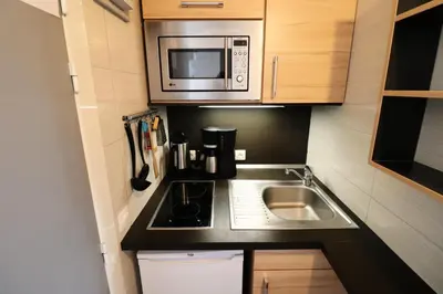 Cuisine ou kitchenette dans l'établissement Résidence Palafour - Studette rénovée MAE-5531