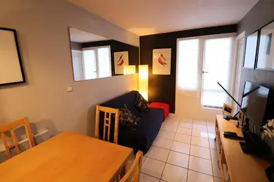 Télévision ou salle de divertissement dans l'établissement Résidence Hameau Du Borsat 3 - Appartement ski aux pieds·Balcon·Parking MAE-9681