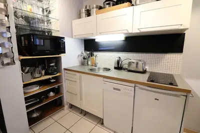 Cuisine ou kitchenette dans l'établissement Résidence Hameau Du Borsat 3 - Appartement ski aux pieds·Balcon·Parking MAE-9681
