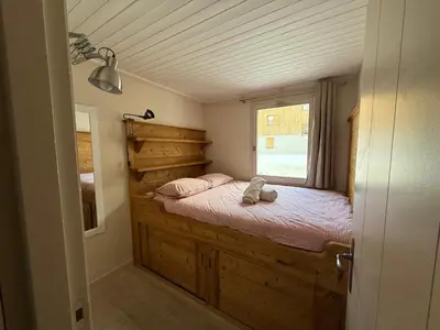 Un ou plusieurs lits dans un hébergement de l'établissement CRISTALLINES App 6 personnes Val d'Isère Centre, Garage