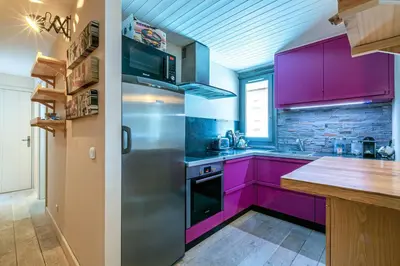Cuisine ou kitchenette dans l'établissement CRISTALLINES App 6 personnes Val d'Isère Centre, Garage