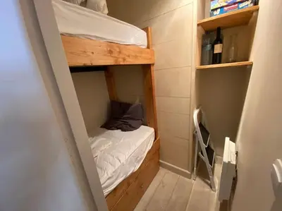 Un ou plusieurs lits dans un hébergement de l'établissement CRISTALLINES App 6 personnes Val d'Isère Centre, Garage