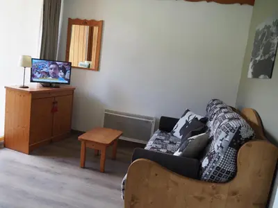 Télévision ou salle de divertissement dans l'établissement Place du Montagnard à Termignon