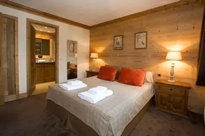 Un ou plusieurs lits dans un hébergement de l'établissement L'Aquila 23 - 2 bedroom apartment on the piste