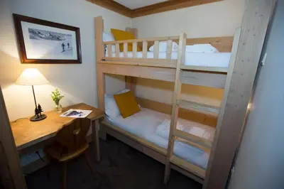 Un ou plusieurs lits dans un hébergement de l'établissement L'Aquila 23 - 2 bedroom apartment on the piste